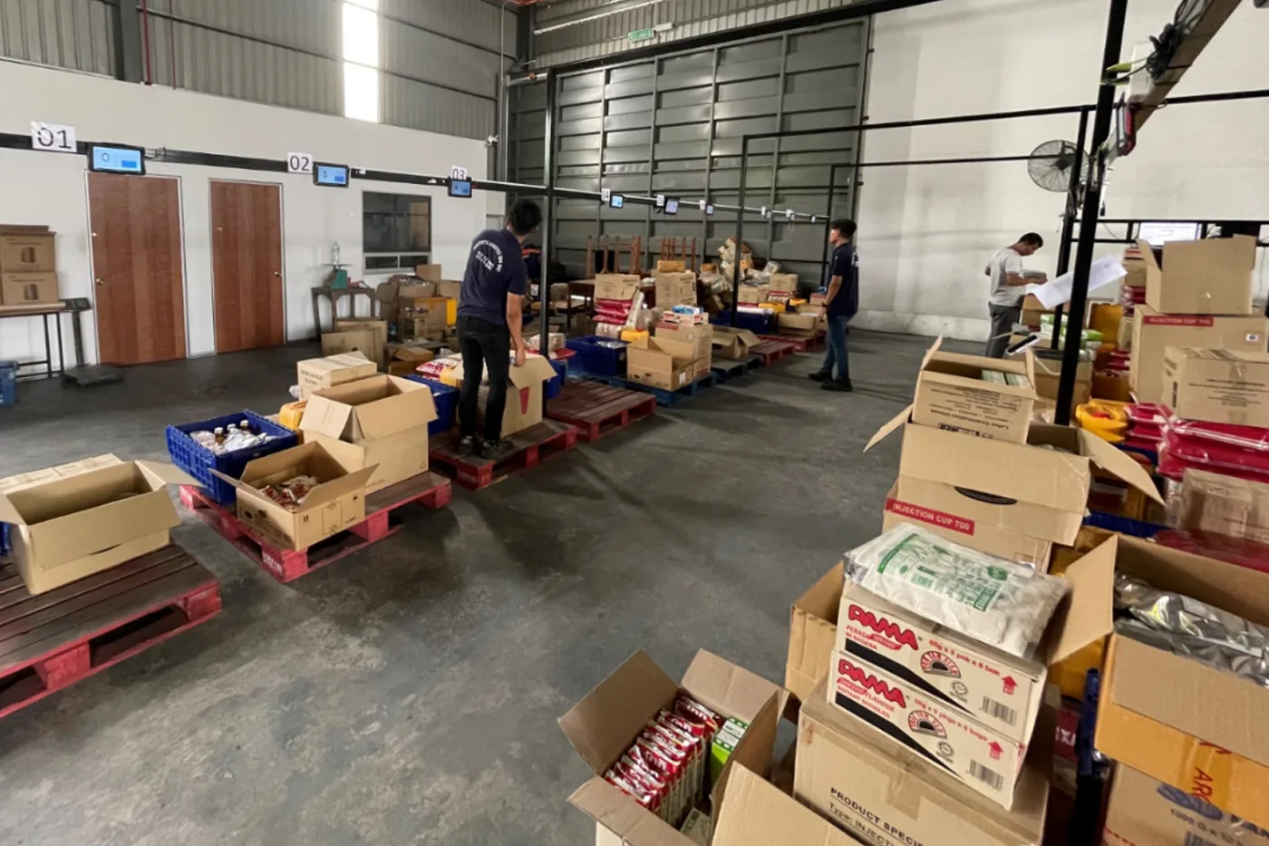 Frostbyte staff preparing customer stock and outgoing orders inside the Shah Alam warehouse